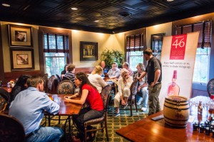 Ambassadors enjoying their time in the tasting room, adjacent to the bar. 